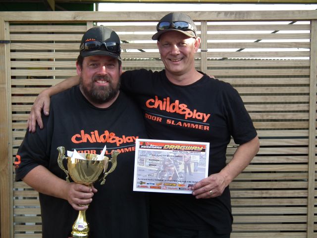 Rod Benjes and partner John Dillon with the 1st Auto Parts Top Doorslammer winners trophy Rod Benjes and partner John Dillon with the 1st Auto Parts Top Doorslammer winners trophy